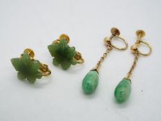 18 ct gold - a pair of 18 ct gold earrings set with Jade and a further pair of yellow metal