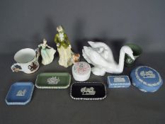 A mixed lot of ceramics to inlculde Wedgwood Jasperware, Royal Doulton figurines and similar.