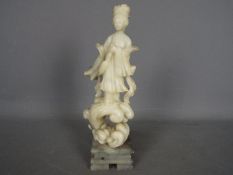 A Chinese hardstone carving depicting Guanyin,