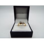 18 ct gold - a 18 ct gold diamond cluster ring set with fourteen 0.2/0.3 points, stamped W.