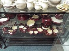 A quantity of Hornsea Pottery tableware in the 'Duet Carmine' design, approximately 95 pieces.