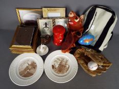 A mixed lot to include ceramics, photograph frames, baseball glove and ball and similar.