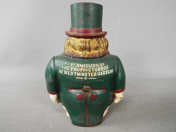 A cast iron 'Transvaal Money Box' in the form of a caricatured President Kruger, - Image 4 of 7