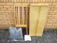 Unused Retail Stock - A box of two oak 'Manhattan' chairs by International Furniture UK Ltd.