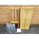 Unused Retail Stock - A box of two oak 'Manhattan' chairs by International Furniture UK Ltd.