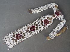 A Victorian necklace with beaded tie