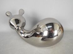 Unused Retail Stock - A boxed ceramic deer with metallic, silver coloured finish,