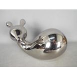 Unused Retail Stock - A boxed ceramic deer with metallic, silver coloured finish,