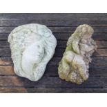 Garden Stoneware - a stone wall mounted plaque depicting a cherub lying on a bed of grapes 30 cm