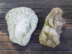Garden Stoneware - a stone wall mounted plaque depicting a cherub lying on a bed of grapes 30 cm