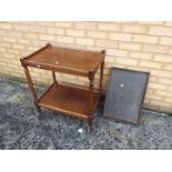 An oak hostess trolley and a wooden tray.