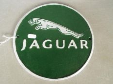 A cast Jaguar sign