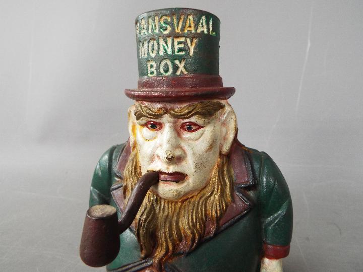 A cast iron 'Transvaal Money Box' in the form of a caricatured President Kruger, - Image 2 of 7