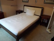 A good quality Laura Ashley double bed and a pair of bedside cabinets measuring approximately 64 cm