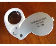 A Jeweller's Loupe, 40 x magnification with internal led illumination,