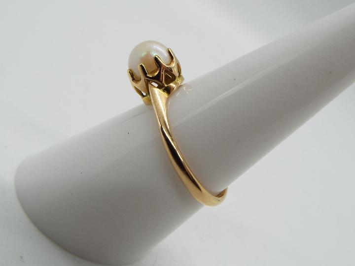 9 ct gold - a 9ct gold ring set with pearl, markings unclear, size N, approximate weight 2. - Image 2 of 5