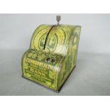 An early 20th century tin litho Commonwealth Bank money bank in the form of a cash register,