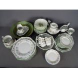 A quantity of table wares comprising Johnson Brothers, Royal Doulton and similar.