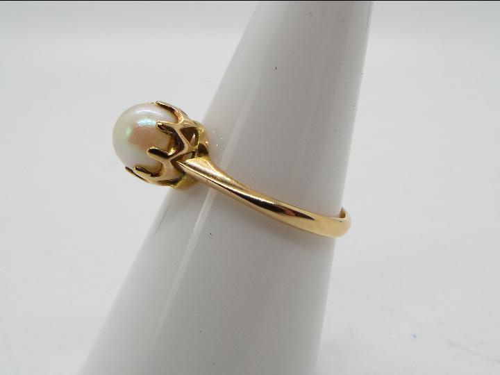 9 ct gold - a 9ct gold ring set with pearl, markings unclear, size N, approximate weight 2. - Image 3 of 5