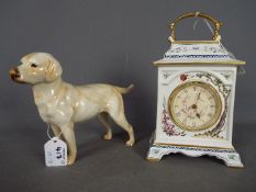 A Goebel figurine depicting a Labrador,