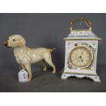 A Goebel figurine depicting a Labrador,