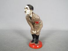 A cold painted bronze pin cushion in the form of Adolf Hitler