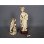 Two early 20th century ivory figurines comprising a fisherman and a courtesan (hand broken but