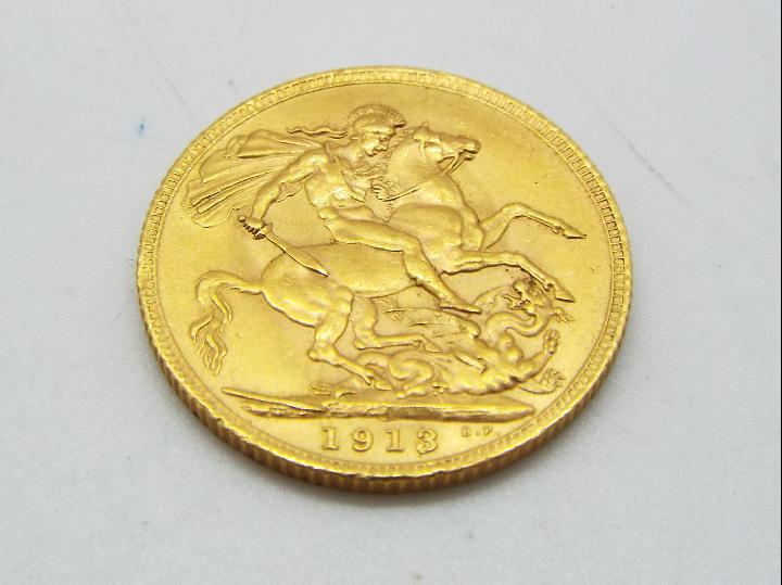 Numismatology - a 1913 gold sovereign - Image 2 of 2