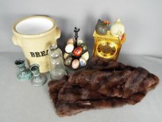 A mixed lot to include decorative stone eggs, candle holders, fur stole, mantel clock and similar.