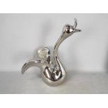 Unused Retail Stock - A boxed ceramic swan with metallic, silver coloured finish,