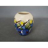 Moorcroft - a Moorcroft vase in the Eight Maids a Milking design,