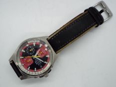 A gentleman's Seiko chronograph on leather strap, V657-9030.