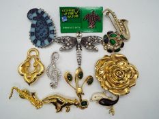 Brooches - twelve brooches with various designs to include stone set animals,