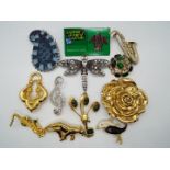 Brooches - twelve brooches with various designs to include stone set animals,