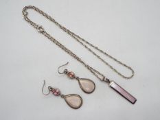 A silver necklace set,