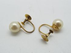 9ct - a pair of 9ct gold earrings with pearl design stamped 9ct