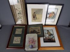 A collection of framed prints and similar.