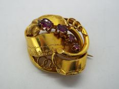 A Victorian brooch set with amethyst
