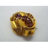 A Victorian brooch set with amethyst