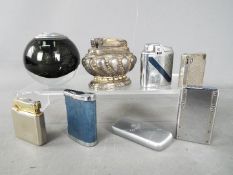 A collection of vintage cigarette lighters to include Ronson, Maruman, Colibri and similar.