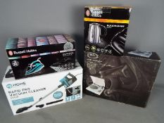 Four boxed household items to include a Rapid Pro vacuum cleaner, Bush MTT1 mini turntable,