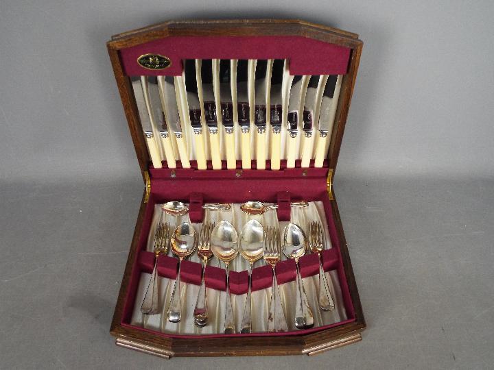 A canteen of plated cutlery by Thomas Turner & Co, Sheffield.