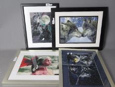 Four framed beadwork pictures of wolves and similar, varying image sizes.