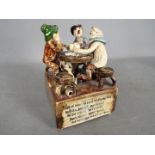 Runnaford Pottery - A Will Young 'Widecombe Fair' musical figural group of characters playing cards,