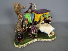 Runnaford Pottery - A Will Young 'Widecombe Fair' figural group 'Bill Brewer Has His Fortune Told