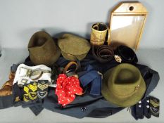 Lot to include gas mask in tin, white military belt and armbands, Corps Of Commissionaires patches,