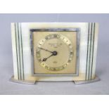 An onyx Elliott mantel clock with malachite striping,