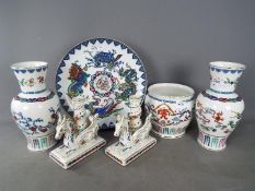 A collection of Franklin Mint Chinese porcelain comprising two baluster vases 'The Dance of the