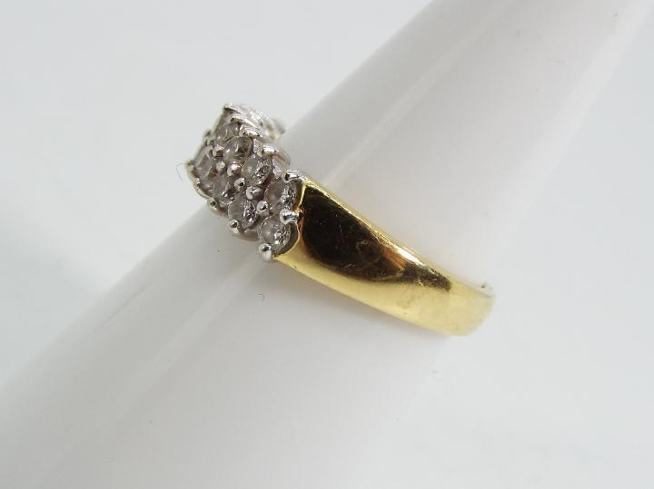 18ct gold - a 18 ct gold ring set with eighteen diamond, stamped .76, size N. approx weight 5. - Image 2 of 5