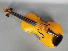 A modern Violin, panel back, interior of body with paper label scribed 'Harry Roberts, violin maker,